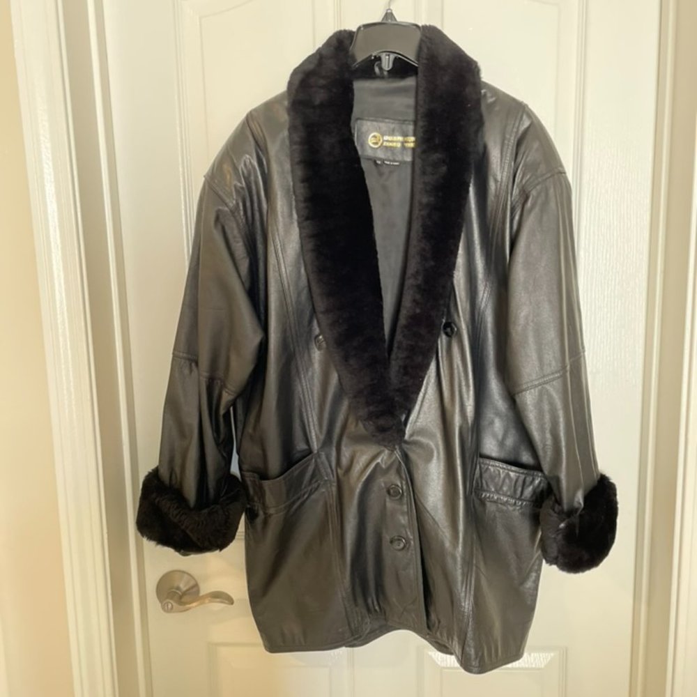 Vintage black leather coat with faux fur collar and cuffs